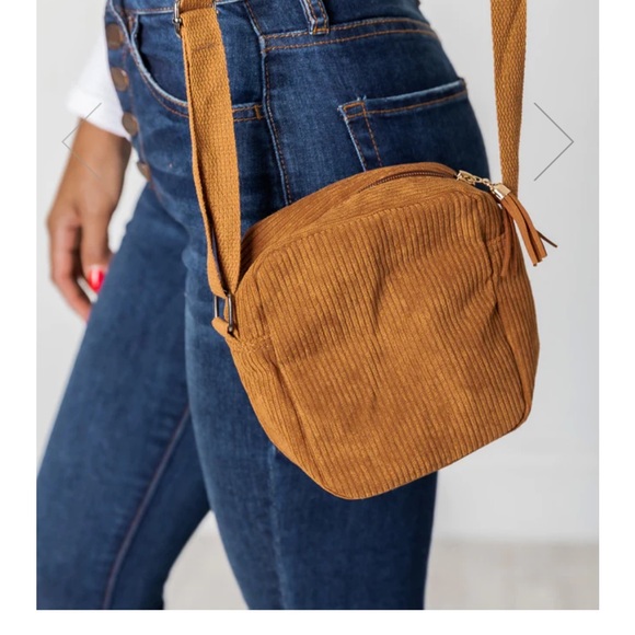 Pink Lily brown sling bag. - Picture 1 of 2